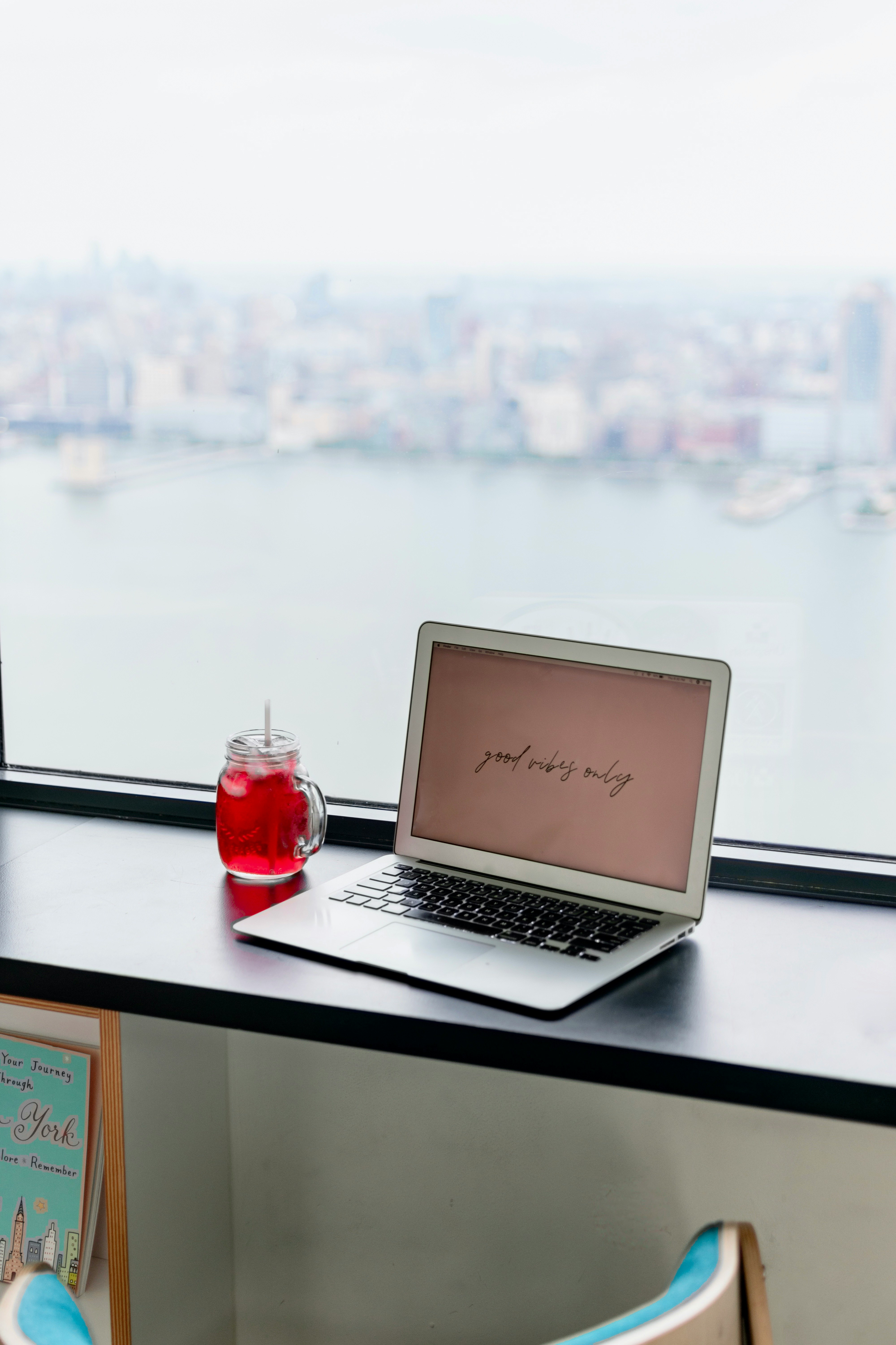 macbook air on white table